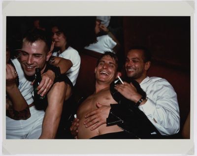 Nan Goldin, Clemens, Jens and Nicolas Laughing at
Le Pulp, Paris, 1999 © Nan Goldin. Courtesy of Nan
Goldin and Gagosian