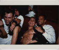 Nan Goldin, Clemens, Jens and Nicolas Laughing at
Le Pulp, Paris, 1999 © Nan Goldin. Courtesy of Nan
Goldin and Gagosian